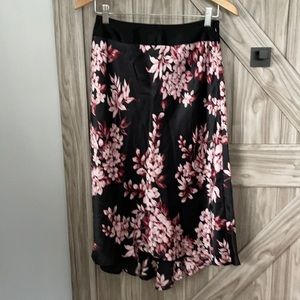 Black low high skirt with pink flower detail
